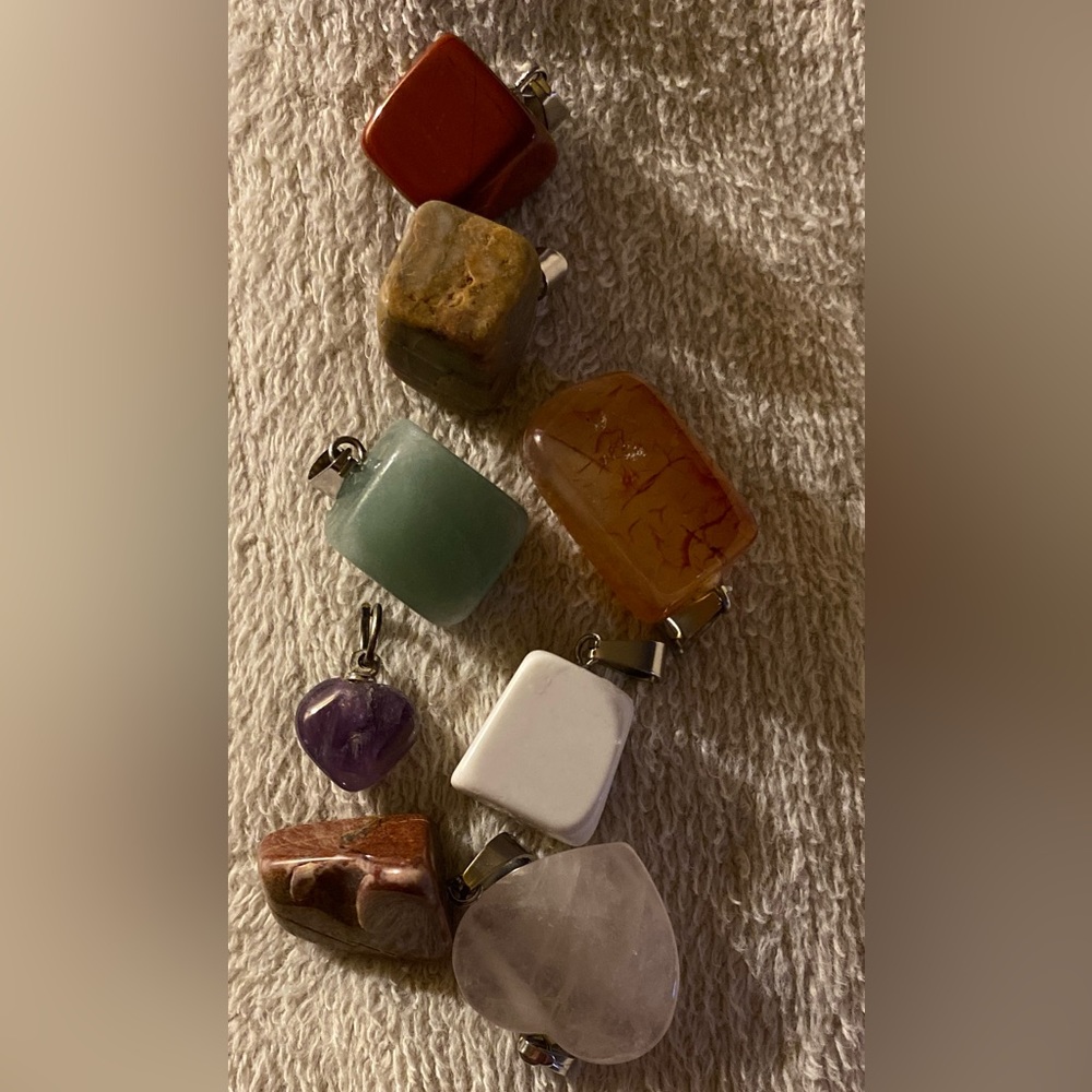 Assortment of stone/crystal pendants, varying sizes & colors
